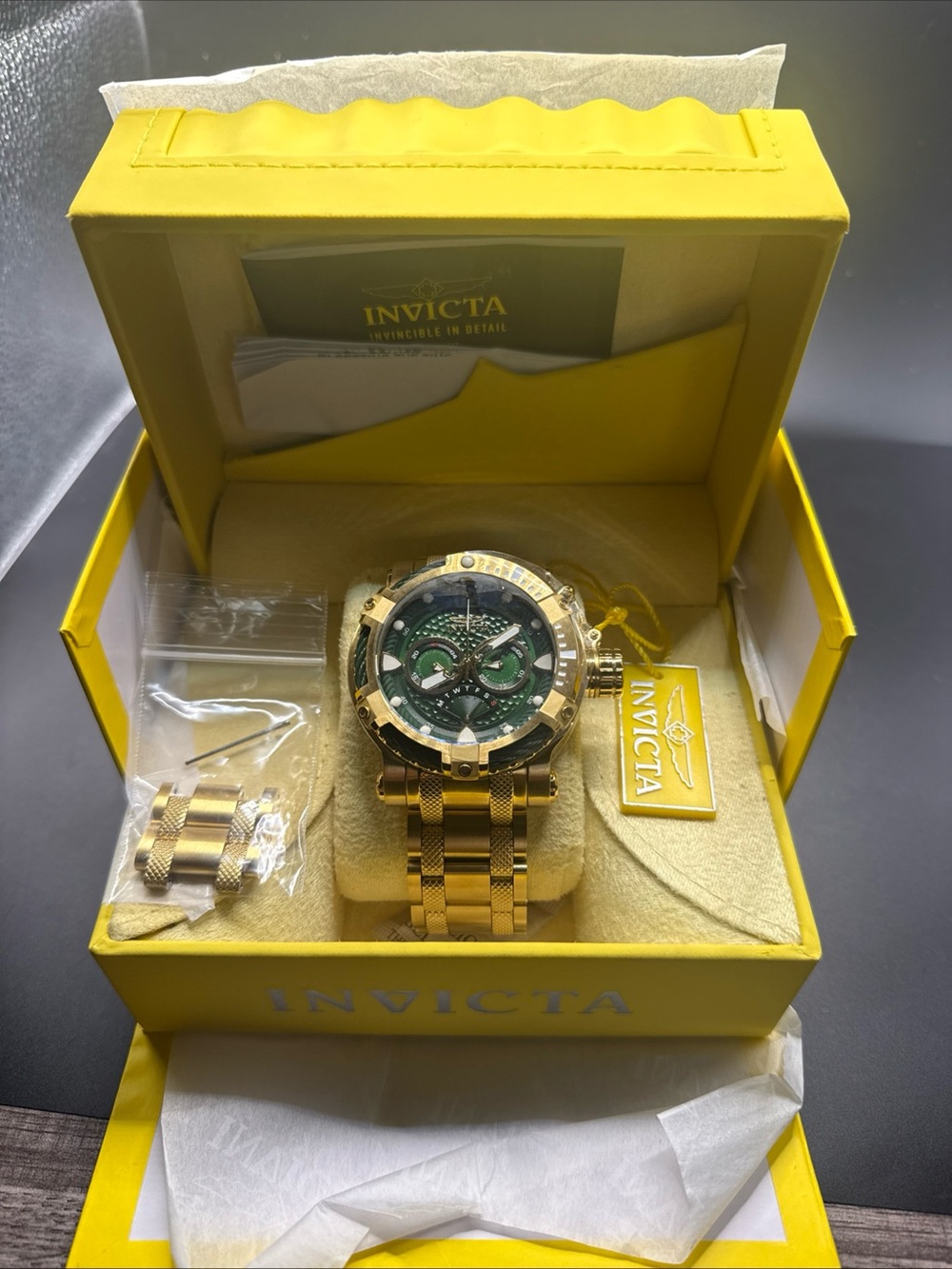 Invicta Men's Bolt model 29832 quartz movement, and gold/green execution